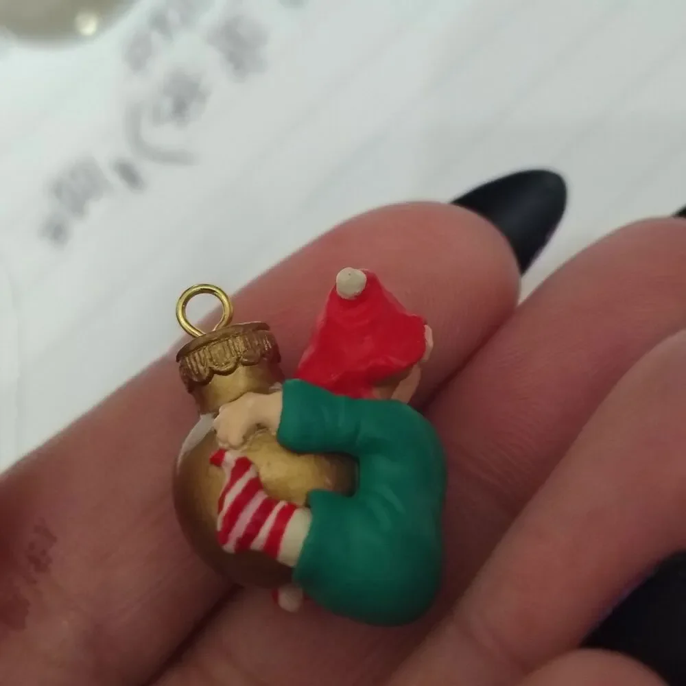 VTGHallmark  Load of Cheer  Elf Holding on to Globe Ornament - Miniature